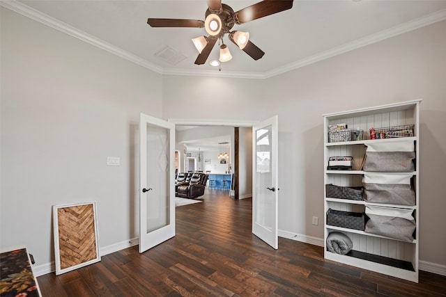 interior space featuring ornamental molding, french doors, baseboards, and hardwood / wood-style floors