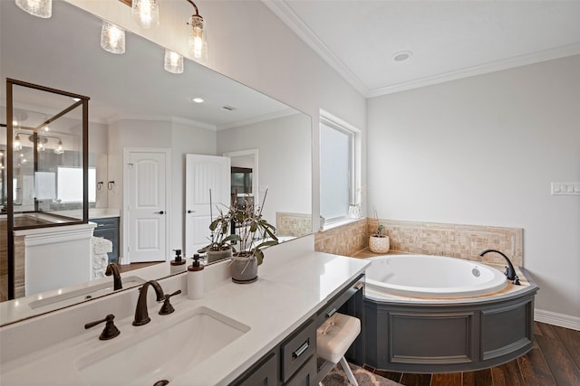 full bath featuring crown molding, wood finished floors, a bath, an enclosed shower, and vanity