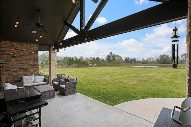 view of patio / terrace featuring a ceiling fan and an outdoor hangout area