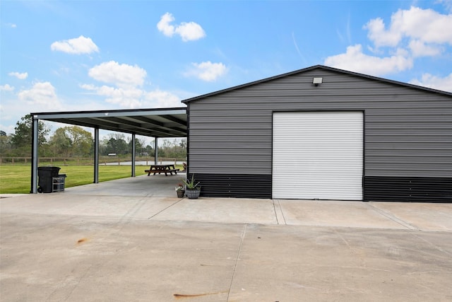 garage featuring a garage and driveway