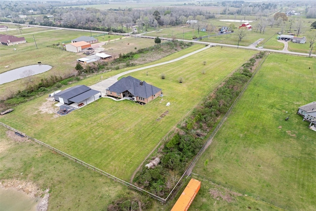 birds eye view of property featuring a rural view