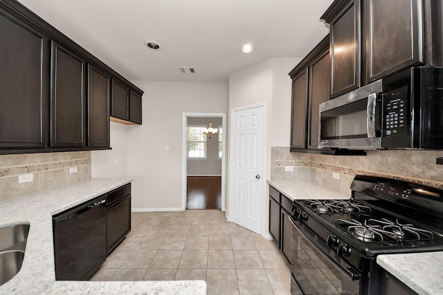 kitchen featuring dark brown cabinetry, decorative backsplash, an inviting chandelier, light tile patterned flooring, and black appliances