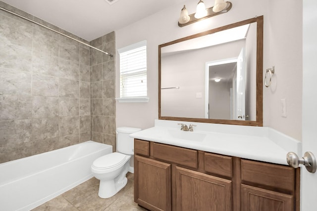 bathroom with tile patterned flooring, toilet, vanity, and washtub / shower combination