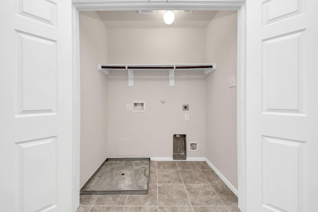 clothes washing area with hookup for a washing machine, hookup for an electric dryer, laundry area, light tile patterned flooring, and hookup for a gas dryer