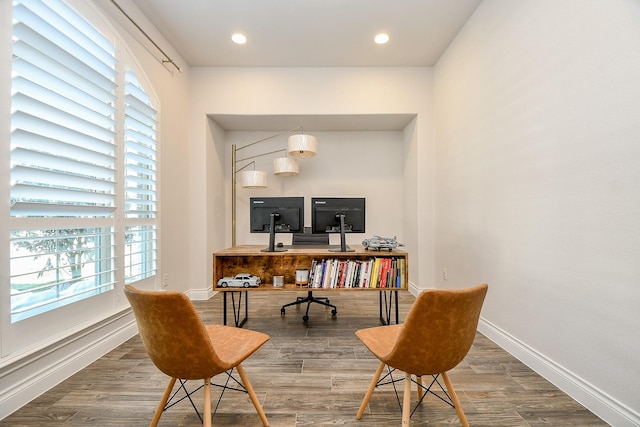 office space with recessed lighting, baseboards, and wood finished floors