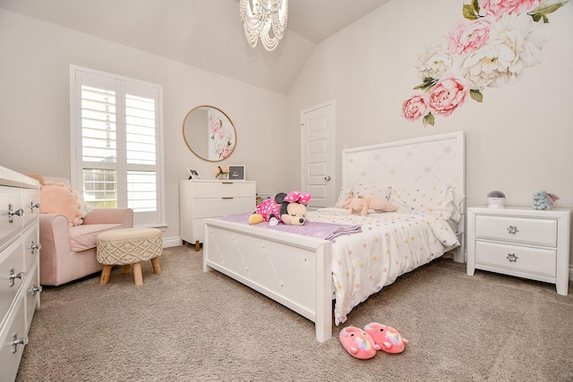 carpeted bedroom with a chandelier and vaulted ceiling