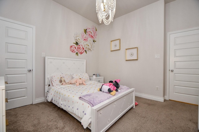 bedroom with baseboards, carpet, and an inviting chandelier