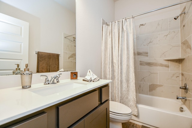 full bathroom featuring toilet, vanity, and shower / bath combination with curtain