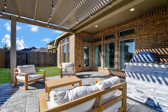 view of patio / terrace featuring a pergola, outdoor lounge area, and fence