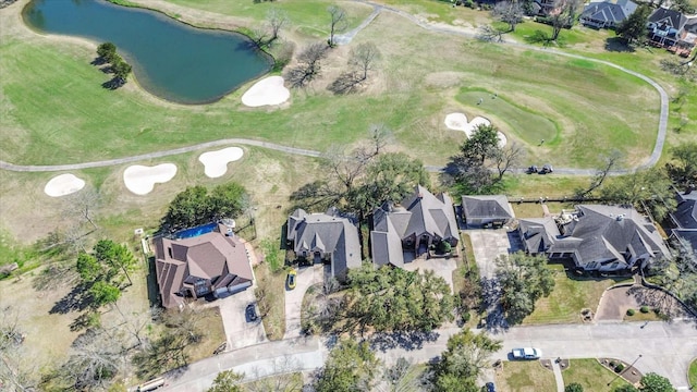 bird's eye view with a residential view, a water view, and golf course view