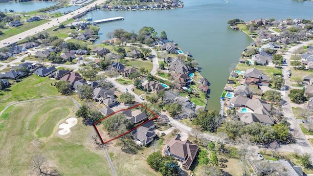 aerial view featuring a residential view and a water view