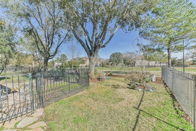 view of yard featuring fence