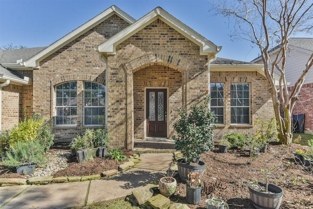 view of front of property featuring brick siding