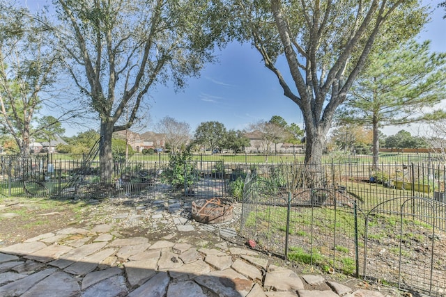 view of yard with a patio and fence