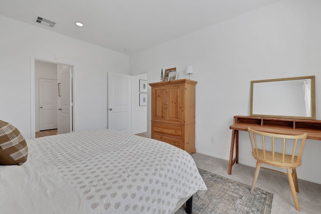 carpeted bedroom featuring recessed lighting, baseboards, and visible vents