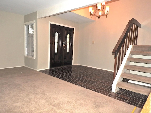 tiled foyer entrance featuring stairway, baseboards, a chandelier, and carpet flooring