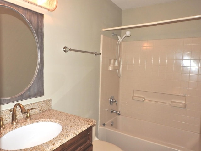 full bathroom with vanity, toilet, and washtub / shower combination