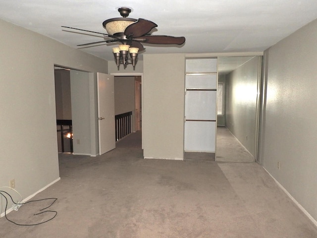 spare room with ceiling fan