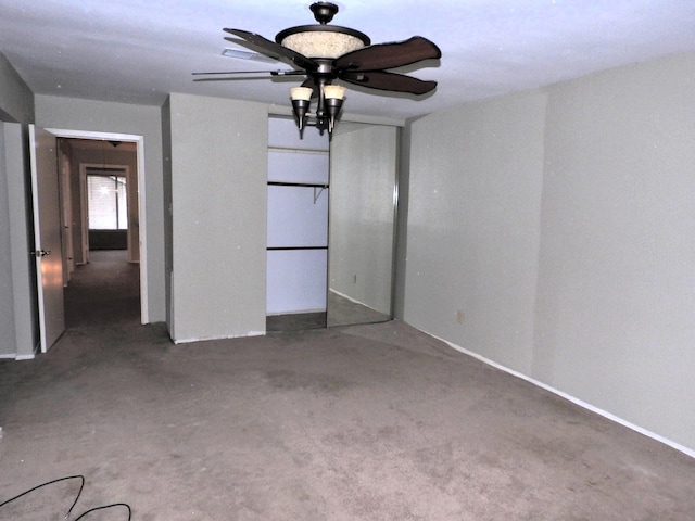 unfurnished bedroom featuring ceiling fan