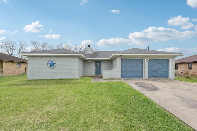 single story home with a front yard, an attached garage, and brick siding