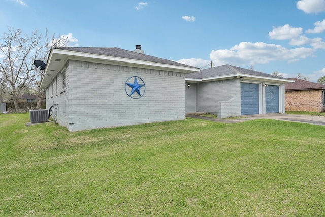 view of property exterior with brick siding, an attached garage, and a yard