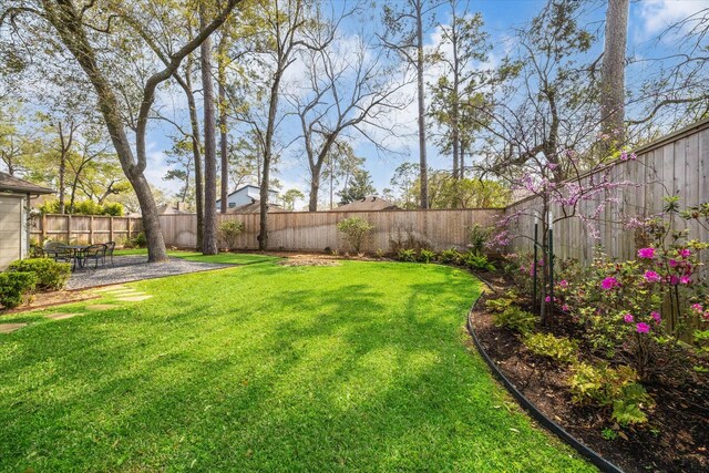 8521 Burkhart Rd, Spring Valley Village, TX 77055 - view of yard featuring a patio and a fenced backyard