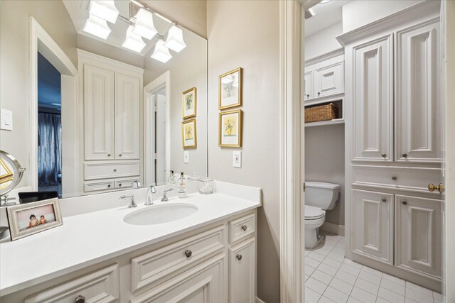 8521 Burkhart Rd, Spring Valley Village, TX 77055 - bathroom featuring tile patterned floors, toilet, and vanity