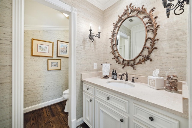 8521 Burkhart Rd, Spring Valley Village, TX 77055 - bathroom featuring vanity, wood finished floors, wallpapered walls, ornamental molding, and toilet