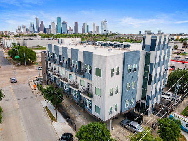 birds eye view of property featuring a view of city