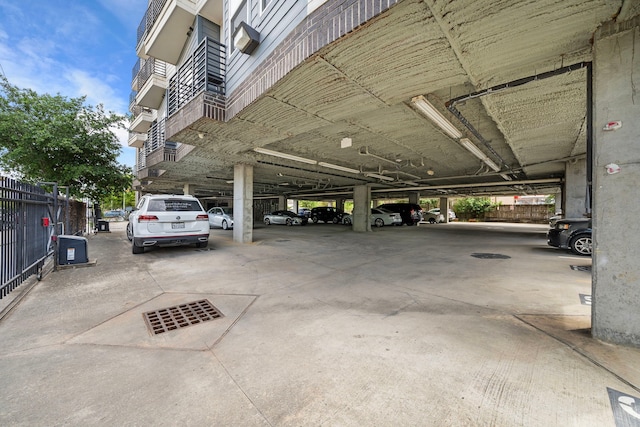 parking garage featuring fence