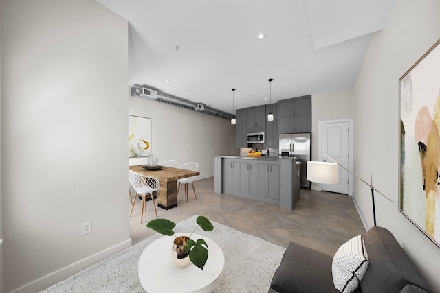 living room with recessed lighting and baseboards