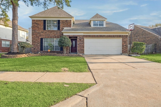 traditional-style house featuring driveway, a shingled roof, a front lawn, a garage, and brick siding