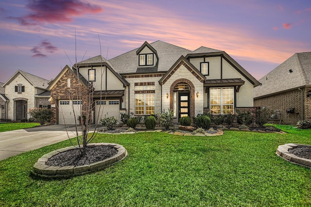13603 Sandford Meadow Ln, Cypress, TX 77429 - view of front of home with stucco siding, stone siding, driveway, and a front lawn