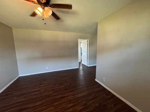 4706 Yellowstone Blvd, Houston, TX 77021 - unfurnished room featuring baseboards, a ceiling fan, dark wood-style flooring, and a textured ceiling