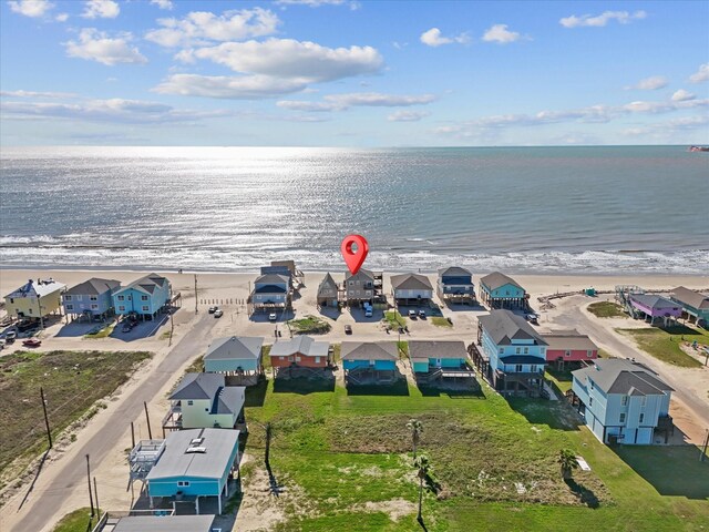 109 Beach Dr, Surfside Beach, TX 77541 - birds eye view of property with a view of the beach, a water view, and a residential view