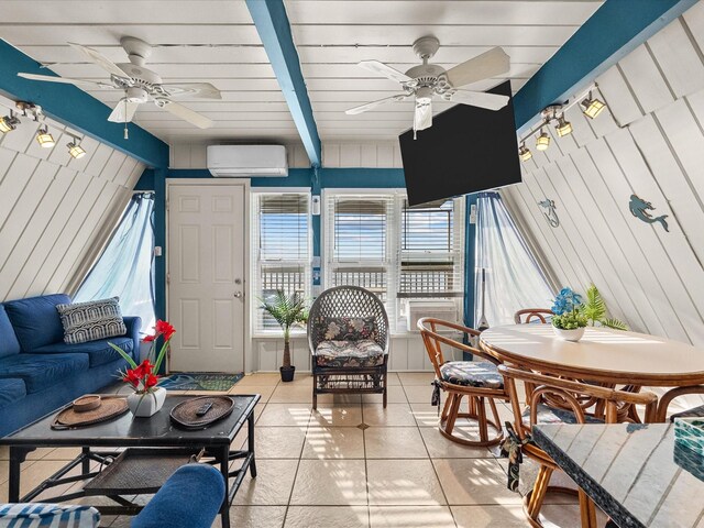 109 Beach Dr, Surfside Beach, TX 77541 - sunroom featuring ceiling fan and an AC wall unit
