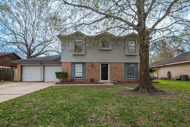 view of front of house featuring a front yard, a garage, fence, concrete driveway, and brick siding