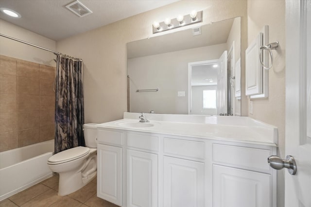 full bathroom featuring visible vents, toilet, shower / tub combo, tile patterned floors, and vanity