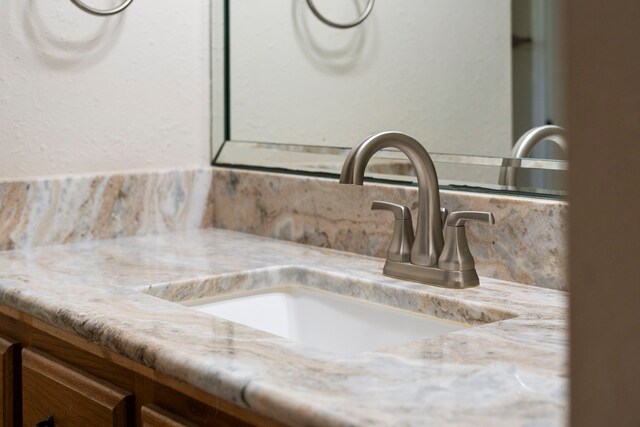 room details with backsplash and vanity