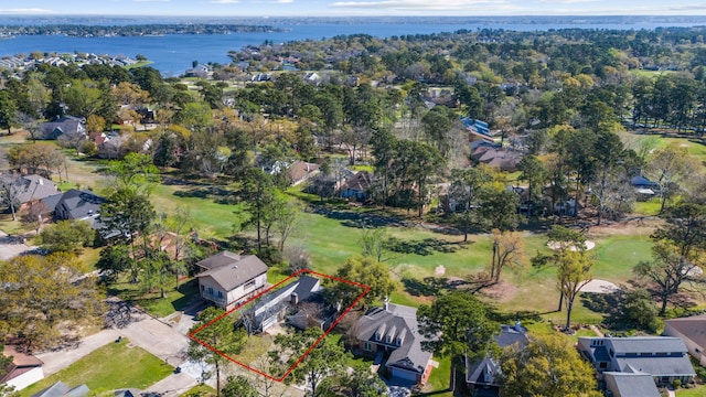 aerial view featuring a residential view, a water view, and golf course view
