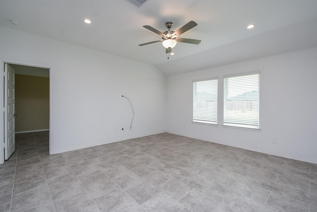 spare room featuring recessed lighting, baseboards, a ceiling fan, and vaulted ceiling