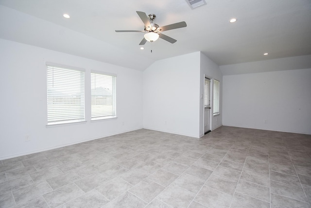 spare room with visible vents, baseboards, lofted ceiling, recessed lighting, and a ceiling fan