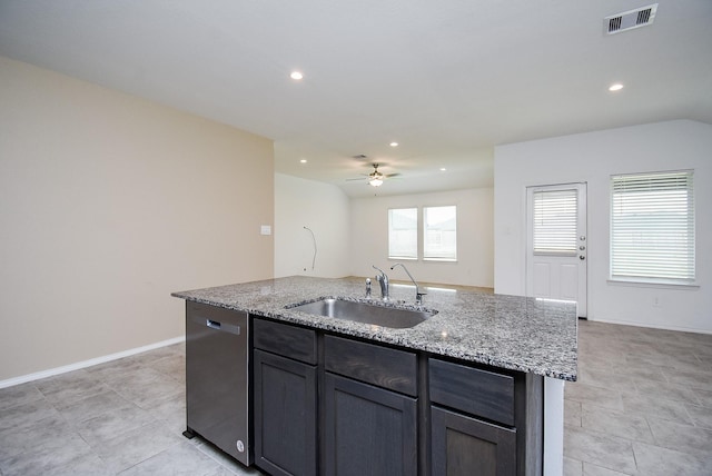 kitchen featuring a sink, visible vents, stainless steel dishwasher, a ceiling fan, and a kitchen island with sink