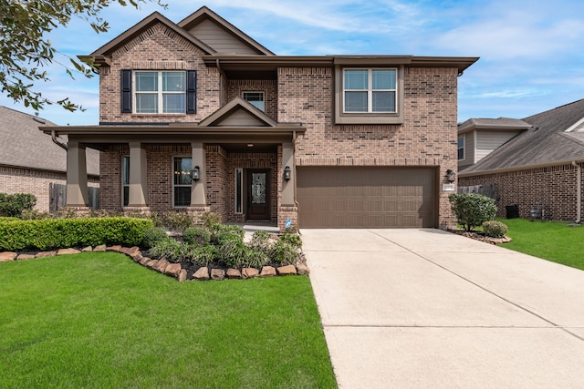 craftsman-style home featuring brick siding, driveway, an attached garage, and a front lawn