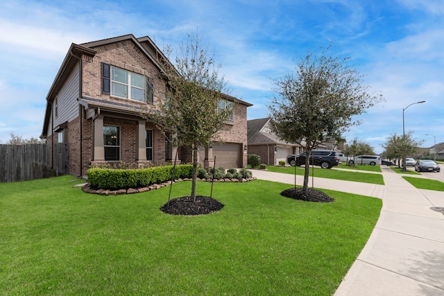 view of front of property featuring brick siding, a front lawn, fence, concrete driveway, and a garage