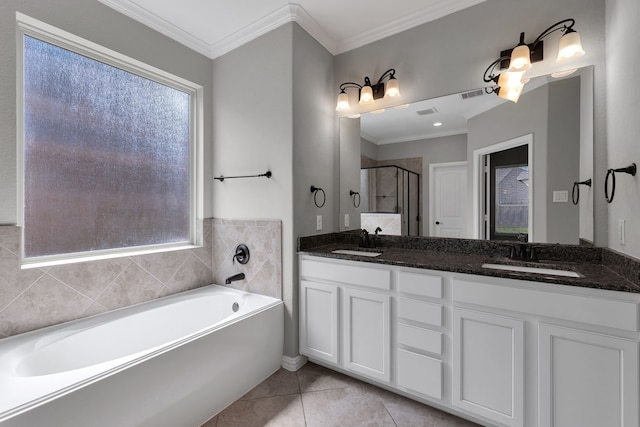 bathroom featuring a sink, tile patterned floors, and crown molding