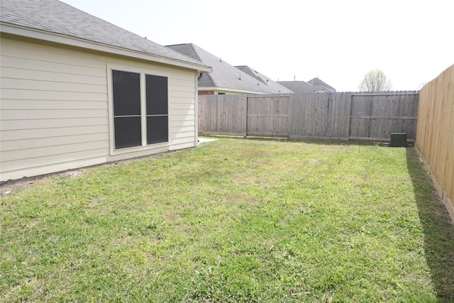 view of yard featuring a fenced backyard