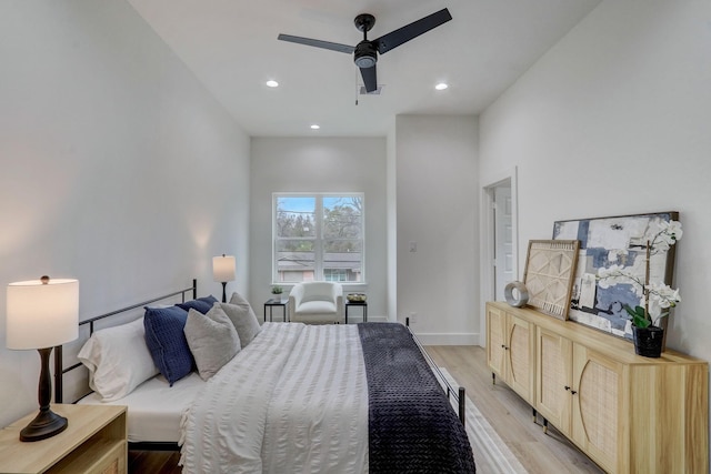 bedroom with recessed lighting, baseboards, light wood finished floors, and ceiling fan