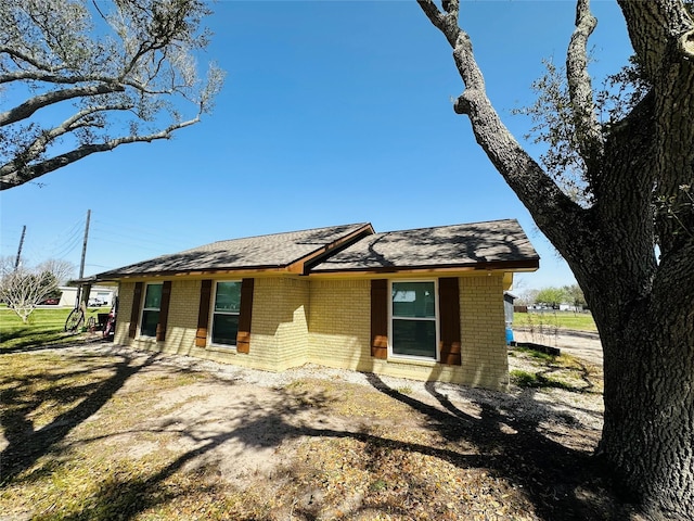 14431 Joyce St, Needville, TX 77461 - view of front facade with brick siding
