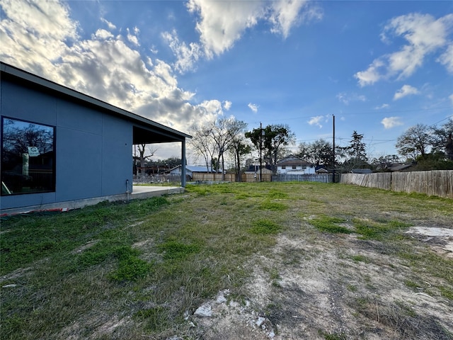 view of yard with fence